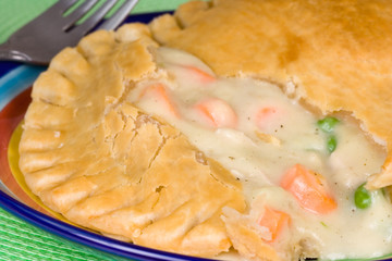 Chicken Pot Pie – Chicken, carrots, and peas in a cream sauce, baked in a pot pie crust.