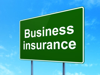 Insurance concept: Business Insurance on road sign background
