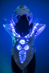cyborg, bionic armor with blue LED lights and plastic materials