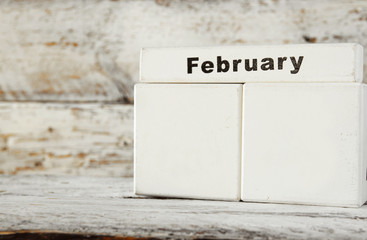 image of February wooden vintage blank calendar on white background. ready to add date. template

