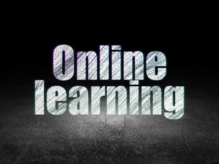 Fototapeta na wymiar Studying concept: Online Learning in grunge dark room