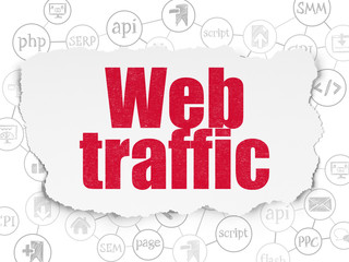 Web development concept: Web Traffic on Torn Paper background