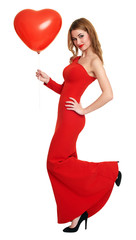woman with heart shape balloon, long red dress
