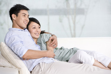 Portrait of a couple relaxing on the couch