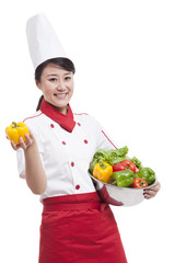 Female cook with bell pepper