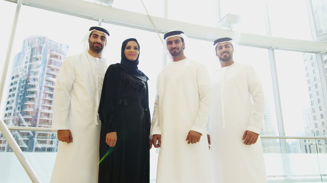portrait business male female national dress Dubai financial real estate 