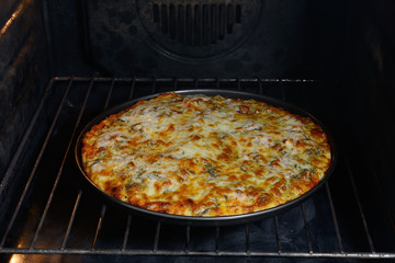 Pizza baked in the oven