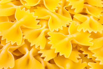 
Italian farfalle pasta as background
