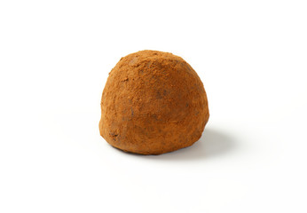 Fototapeta premium Cocoa dusted chocolate truffle