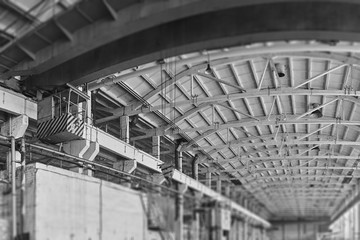 Spacious hangar area with crane.