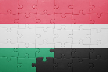 Fototapeta premium puzzle with the national flag of hungary and yemen