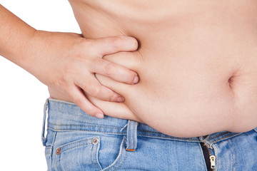 Fototapeta premium abdominal surface of fat woman on white background
