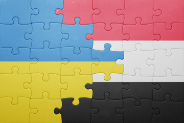 Fototapeta premium puzzle with the national flag of ukraine and yemen