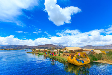 Totora boat on the Titicaca lake near Puno, Peru - obrazy, fototapety, plakaty