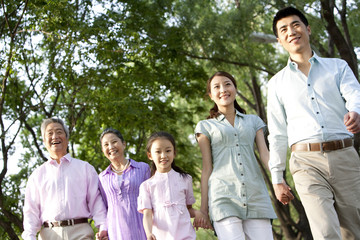Family walking through the park