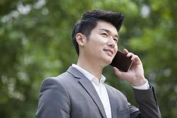 Young businessman talking on the phone