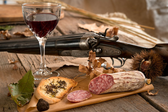 The typical autumn food of the italian hunting tradition, especially in Tuscany, greeting card, Italy