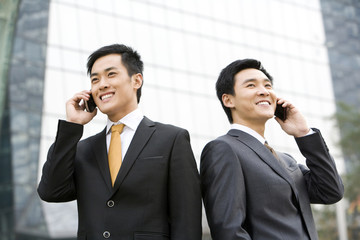 Businessmen talking on cellphone