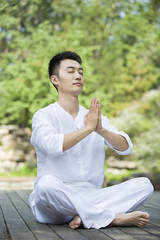 Young man practicing yoga