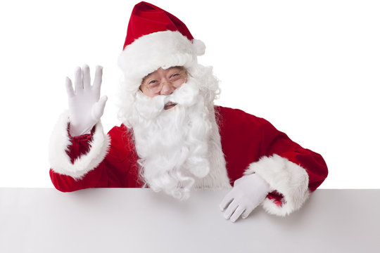Santa Claus with blank whiteboard