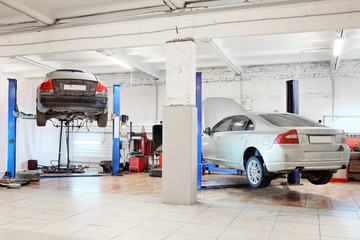 Image of a car repair garage - Powered by Adobe