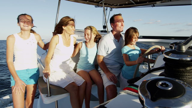 Happy Young Loving Caucasian Family Female Children Luxury Yacht Travel Leisure
