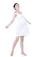 Portrait of cheerful pregnant woman