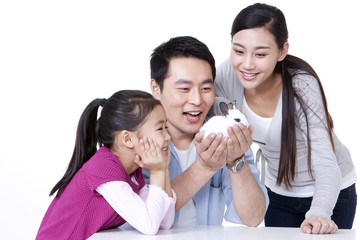 Happy family with a pet rabbit