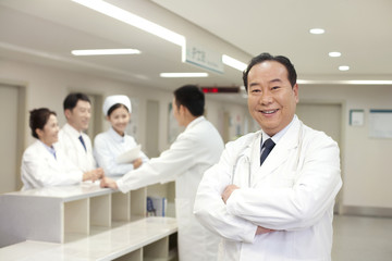 Fototapeta premium Portrait of a confident senior doctor