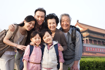 Happy family travelling at Tiananmen Square in Beijing, China