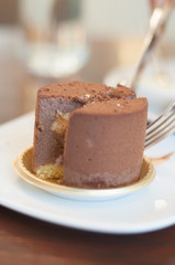 eating of chocolate cake in coffee shop