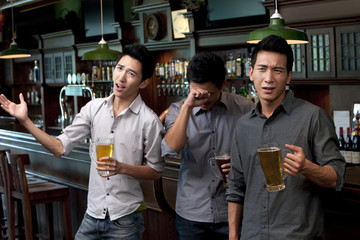 Friends Watching Sports at a Bar