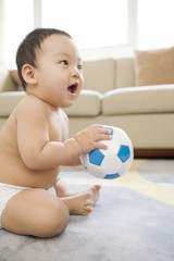 Infant with soccer ball