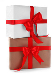 Beautiful gifts with bows isolated on white