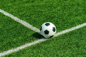 Fototapeta na wymiar Soccer football field stadium grass line ball