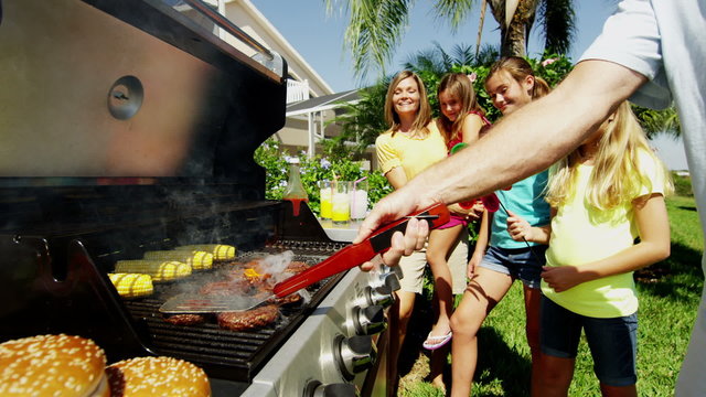 Healthy Lifestyle BBQ Cooking Lunch Caucasian Family Three Daughters Home Garden
