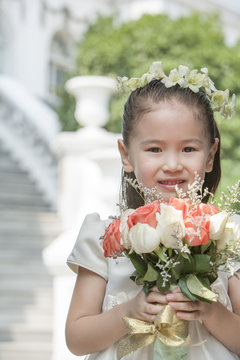 A young flower girl for a wedding