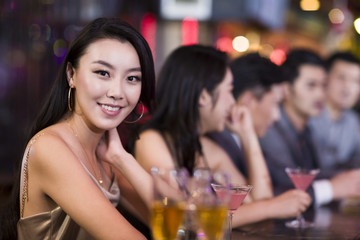 Young woman in bar