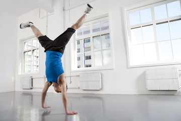 Young Man Doing Handstand