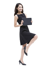 Young businesswoman with digital tablet