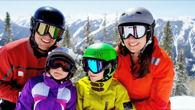 portrait snow outdoor lifestyle Caucasian family promotion winter vacation