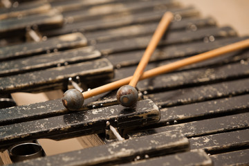 Drumsticks lying on the xylophone