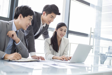 Young business person talking in meeting