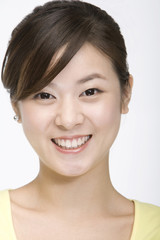 Close-up of smiling young woman