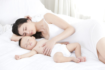 Mother and baby in sweet dreams