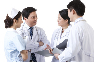 Happy professional medical team in discussion