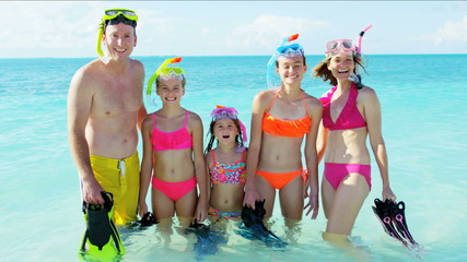 portrait young Caucasian family daughters swimwear snorkeling tourism travel
