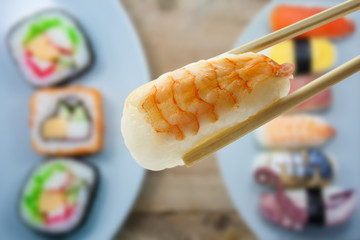 sushi with chopsticks