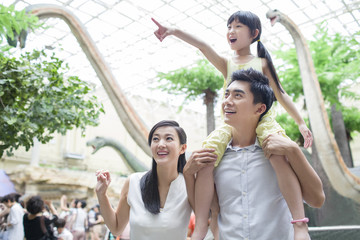 Young family in museum of natural history