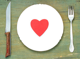 Red heart on plate